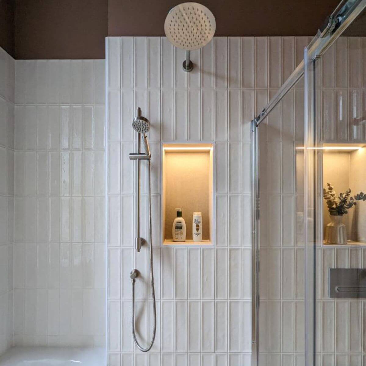 Vedra Ivory Brick Wall Tiles laid in a vertical straight stack in a contemporary, neutral shower room